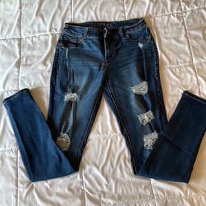 Distressed skinny jeans